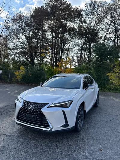 Clean Carfax, non-smoker 2024 Lexus UX-Series Premium in White with Gray interior, front three quarter view