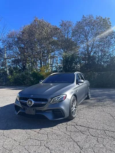 non-smoker 2019 Mercedes-Benz E-Class E63SAMG in Gray with Black interior, front three quarter view