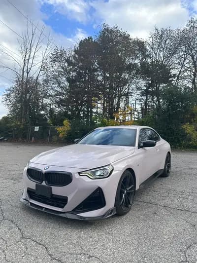 Clean Carfax, non-smoker 2022 BMW 2-Series M240i xDrive in Blue with Black interior, front three quarter view