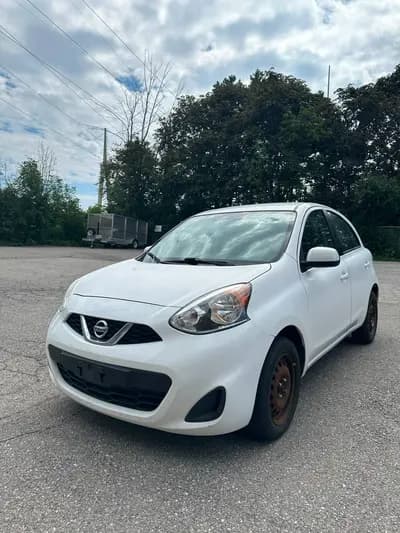 2019 Nissan Micra SV in White with Black interior, front three quarter view