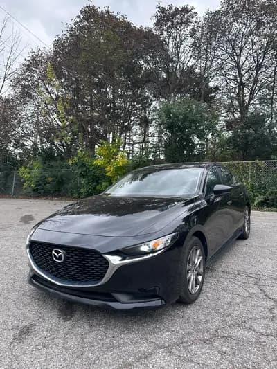 Clean Carfax, non-smoker 2020 Mazda Mazda3 GX in Black with Gray interior, front three quarter view