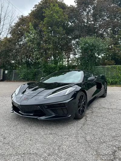 non-smoker 2024 Chevrolet Corvette Stingray 2LT in Black with Black interior, front three quarter view